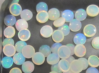 7mm Ethiopian opal cabs round
