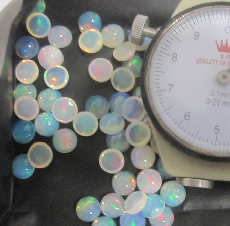 7mm Ethiopian opal cabs round