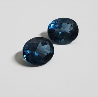 London Blue Topaz Oval faceted 12x10 mm