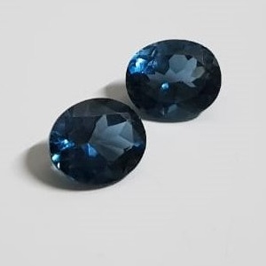 London Blue Topaz Oval faceted 12x10 mm