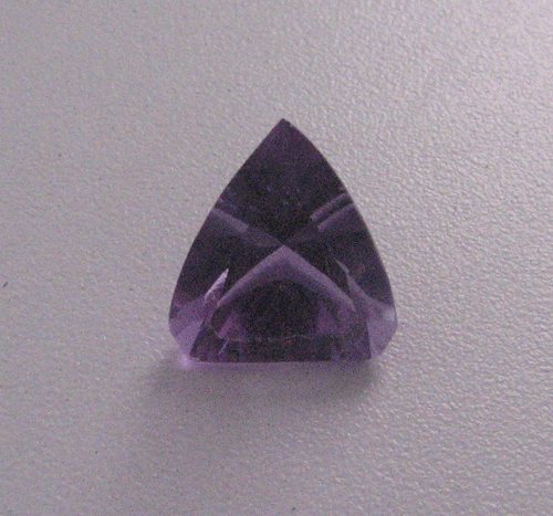 Amethyst 2 Side Rounded Triangle Concave Cut