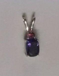 Amethyst cushion and round pendant