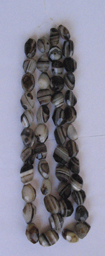 Banded agate faceted tumble