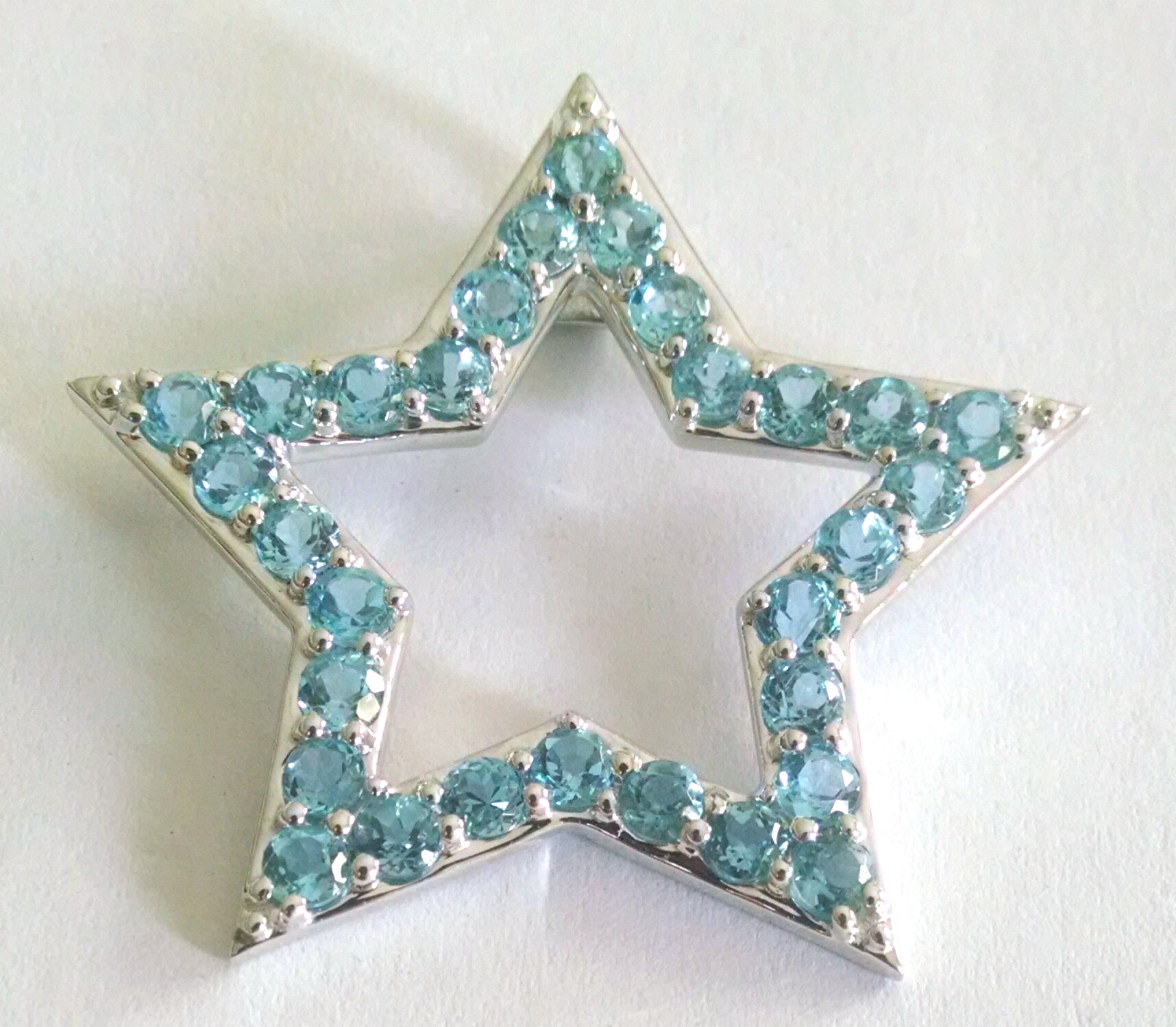 Blue topaz star pendant