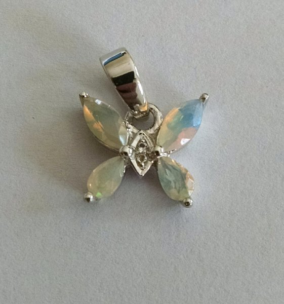 Butterfly pendant in white quartz