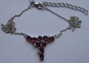 Gold Necklace With rhodolite and w. topaz
