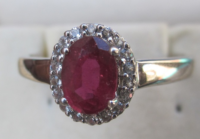 Gold Ring With ruby and topaz
