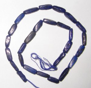 Lapis plain twisted gem beads.