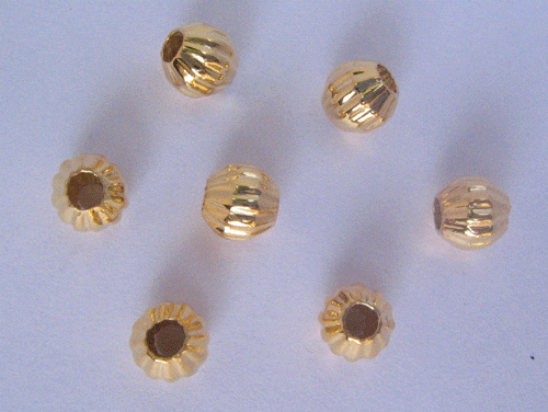 Melon cut Gold Beads