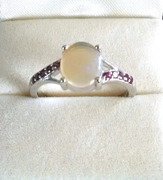 Opal solitaire ring