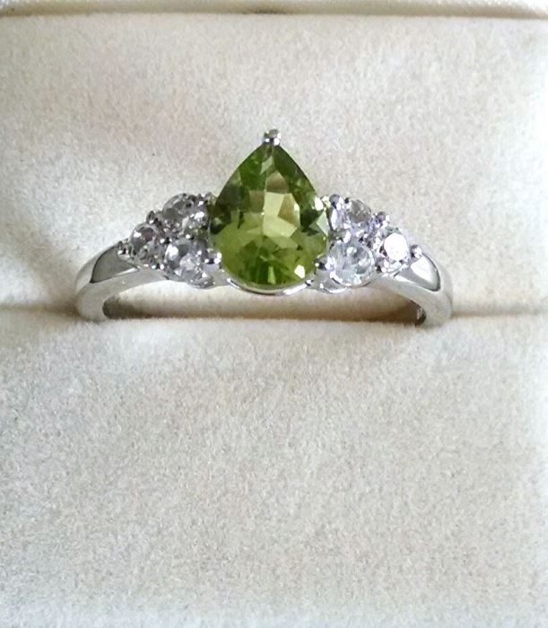 Peridot pear solitaire ring