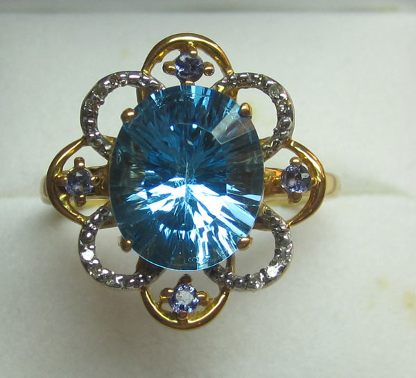 Ring With Diamonds,iolite, and swiss blue topaz