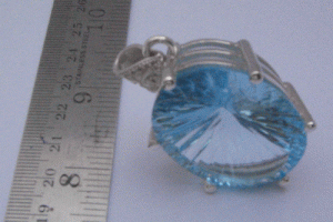 Silver Pendant With Blue Topaz