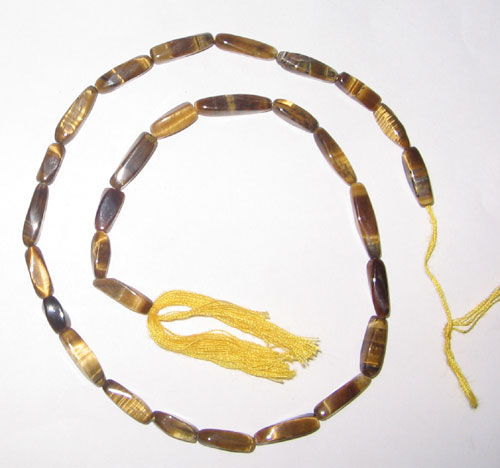 Yellow tiger eye twisted gem beads.